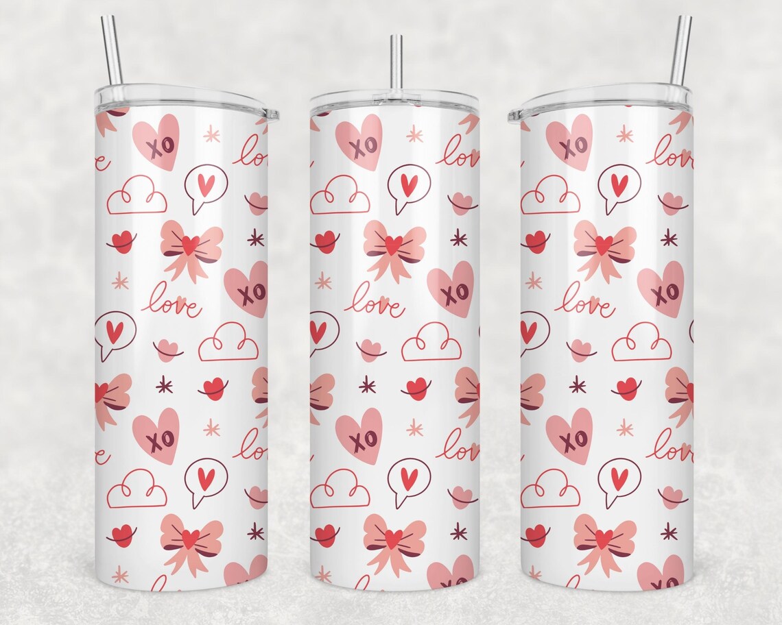 https://badgermountaine.com/wp-content/uploads/2022/01/VT-00104-Pink-Hearts-and-Clouds-Tumbler.jpg